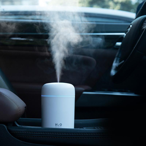 Mini humidificador de aire y difusor de aceites aromáticos. Tanque de agua de 300ml. Con luz nocturna de colores / Portable Air Humidifier Aroma Essential Oil Diffuser for Car Home